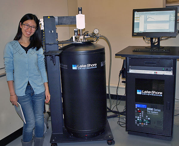 Yue Huang of the Mittleman Lab next to the 8500 Series THz system 